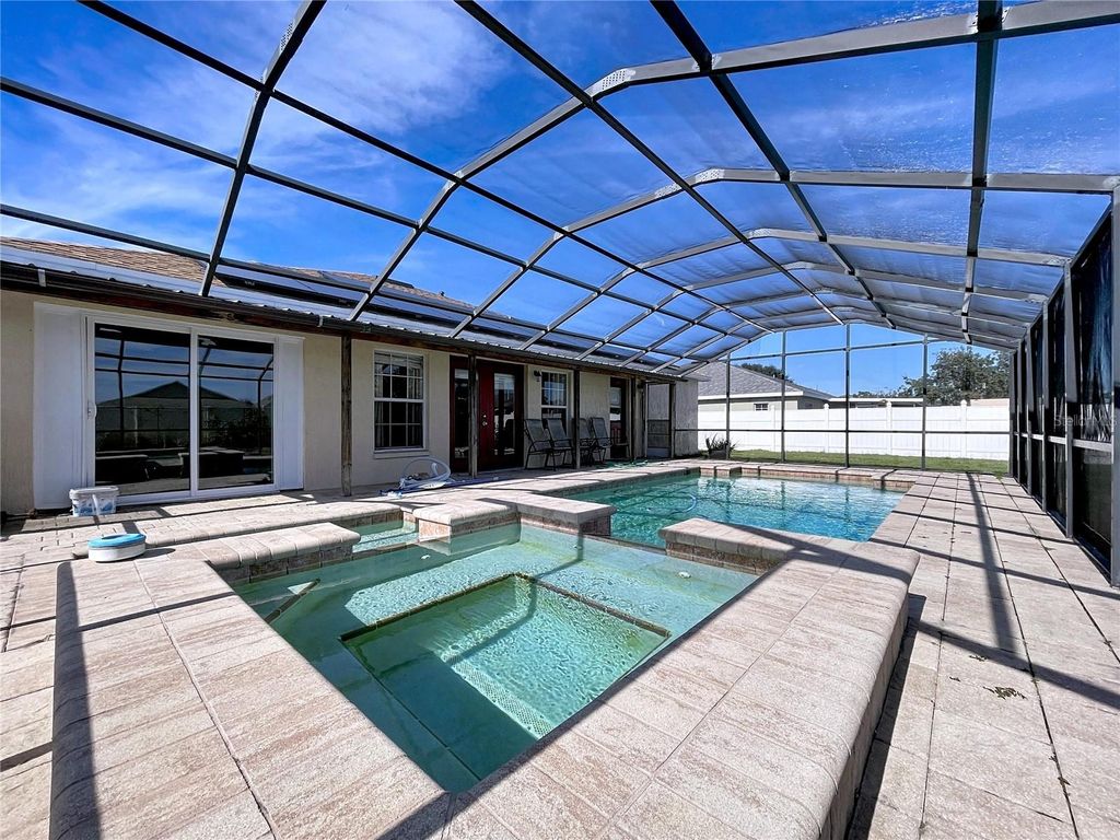 Photo of 455 Majestic Gardens Boulevard, Winter Haven, FL 33880 (MLS # B4902136)