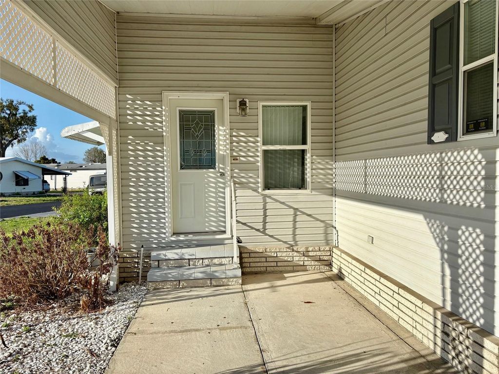 Photo of 6133 Grand Oaks Drive SE, Winter Haven, FL 33884 (MLS # L4959932)