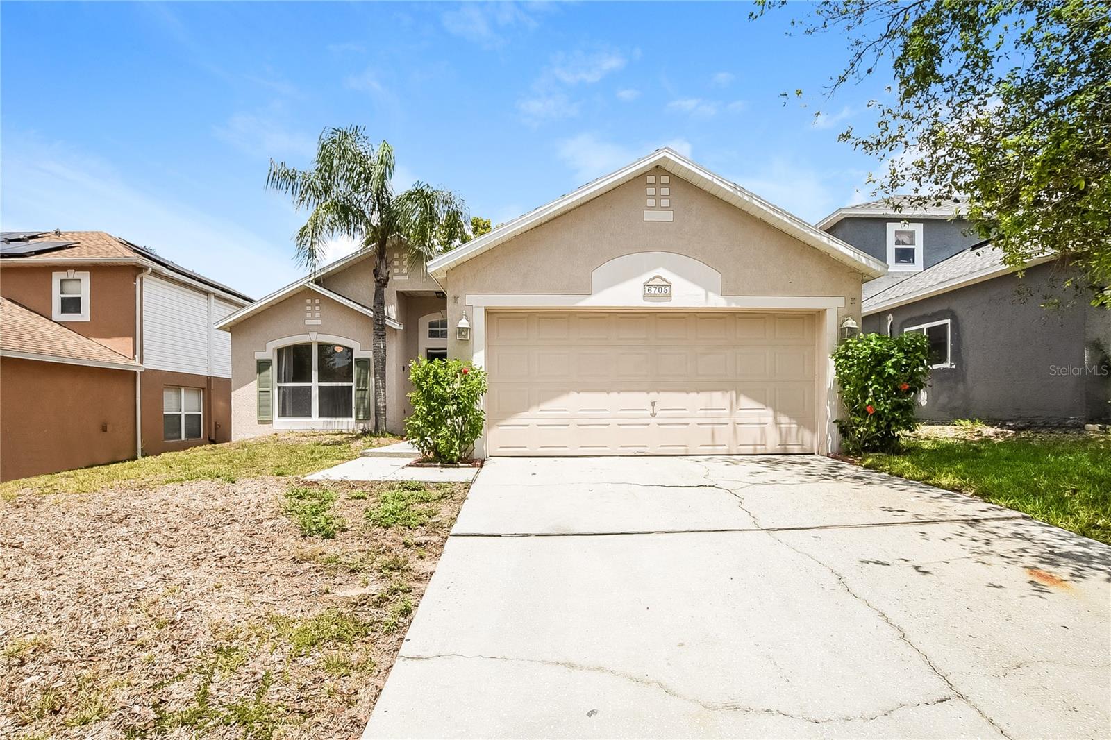 Come check out this beautifully updated 3 bedroom, 2 bathroom, 2 car garage in the Westlake community of Orlando! Enjoy the spacious feel of this home the second you walk through the door with vaulted ceilings and a split/open floorplan that allows you to customize to your liking! Freshly painted interior with brand new LVP flooring throughout for effortless upkeep. The kitchen has been completely redone and is a chef's delight with tons of cabinet/countertop space, granite, breakfast bar perfect for entertaining, and stainless steel appliances! Master suite features a walk-in closet and en-suite bathroom with a garden tub, stand-up shower, and vanity with sitting area! Water heater replaced 2023 and AC in 2015. Enjoy evenings on your screened-in patio complete with a doggy door to the privacy fenced backyard perfect for your furry friends! Convenient to shopping/food and major roads such as 414, Orange Blossom Trl, I-4, and more!