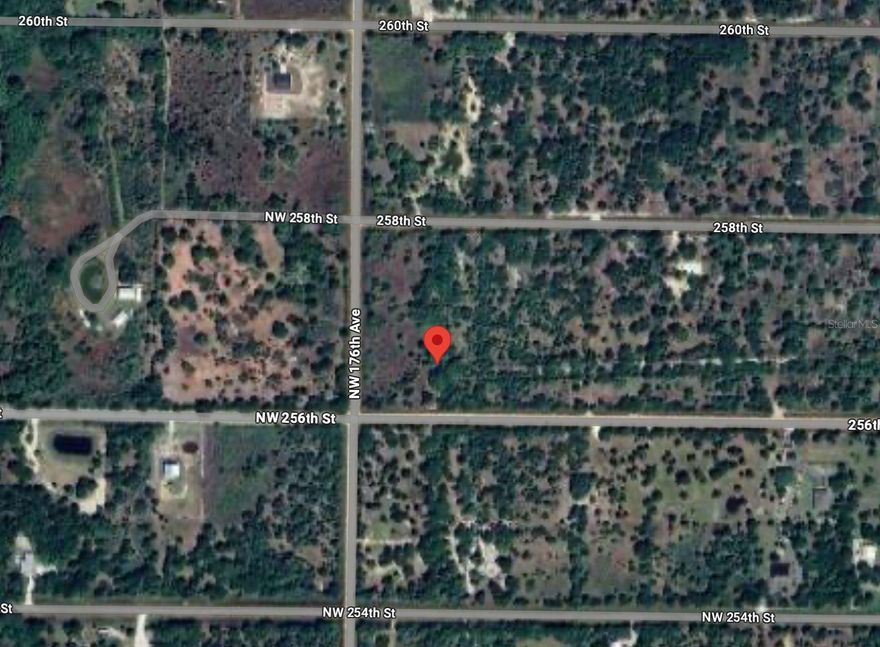 1.25-acre vacant lot in peaceful NW Okeechobee. Zoned for residential/agricultural use with electricity nearby. Build your dream home or enjoy as a weekend getaway. No HOA, close to Lake Okeechobee and public land for recreation.