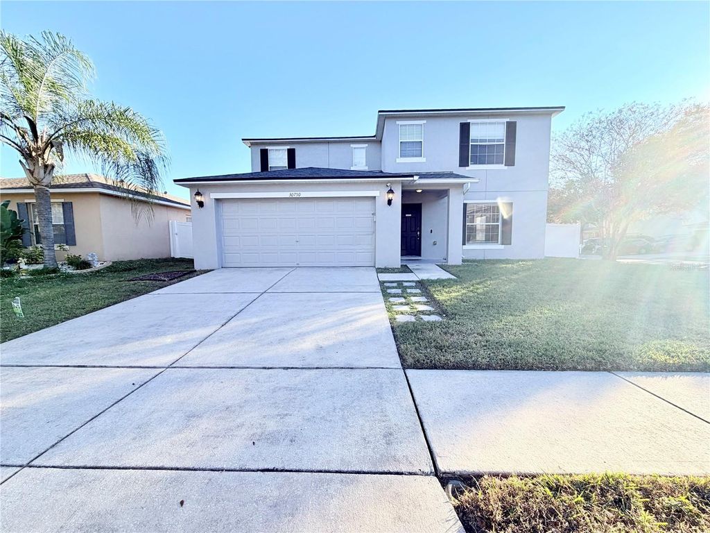 Photo of 30750 Temple Stand Avenue, Wesley Chapel, FL 33543 (MLS # TB8452203)