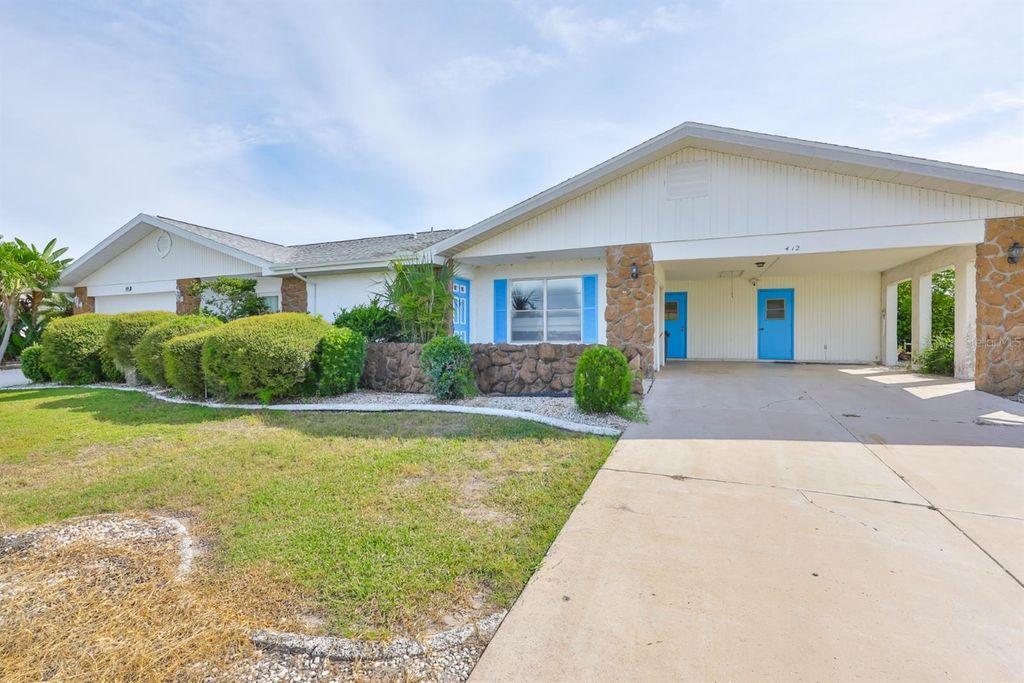 Photo of 412 S Pebble Beach Boulevard, Sun City Center, FL 33573 (MLS # TB8430463)