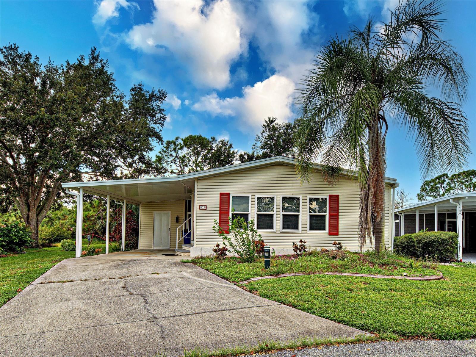 One or more photo(s) has been virtually staged. Welcome to this charming 2-bedroom, 2-bath manufactured home, built in 1990 and beautifully maintained. Featuring vaulted ceilings, updated windows, and a brand-new roof in 2023, this home is move-in ready. Located in the desirable Riverwalk community, residents enjoy stunning landscaping, scenic hiking trails, and a kayak launch for outdoor adventures. Inside, you’ll find a bright, open floor plan with a spacious kitchen offering ample storage, an inside laundry room, and a primary suite with an ensuite bath. The large Florida room overlooks both a preserve and a lake, creating the ideal backdrop for relaxation or entertaining. Whether you’re searching for a winter retreat, investment property, or starter home, this one checks all the boxes. Don’t wait—winter is coming! The home is vacant and easy to show. Schedule your showing today and make this Florida lifestyle your own.