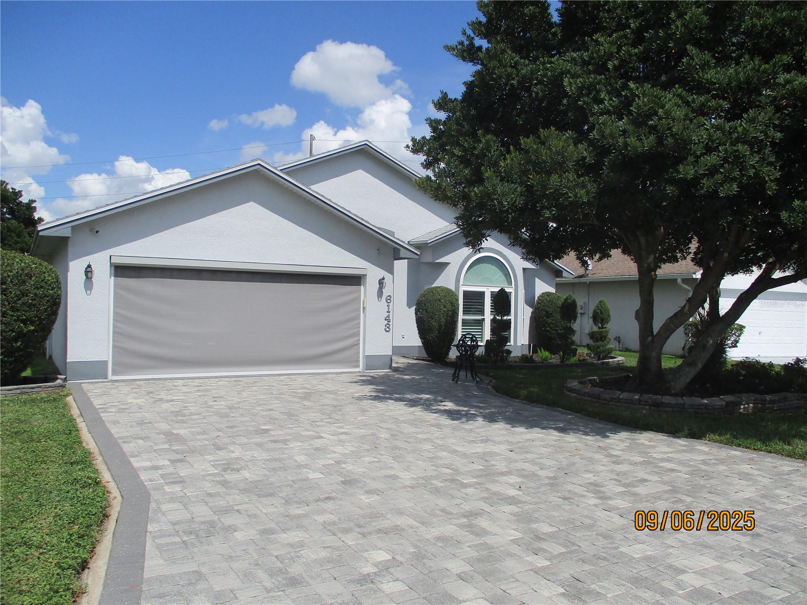 MOVE IN READY, CAN COME FURNISHED, NEW SECTIONAL SEATING IN LIVING ROOM AND DINING. T.V. on wall, lots of quality furniture available at a reasonable price. Great Location on Crane Drive, no-one behind, huge green area behind. Must view to appreciate all the upgrades, updated kitchen and appliances, updated tiled bathrooms, fitted washer/dryer in guest bath, all showers, no bathtubs. Fresh and clean. Pavers great you up to front door. Window World Widows throughout 2017, New roof 2022, New A/C 2022, New Water Heater 2022, Window Shutters 2010, Alarm System - Simply Safe, Attic has blown insulation, electric garage screen door 2022, 2 car garage has refrigerator and storage. Interior laundry, Irrigation all around, huge oversized lanai. New stove and refrigerator just 3 months old. Sandpiper Golf & Country Club is a 55 plus community, offering, some 80 activities, travel options, 2 heated swimming pools all year round, tennis, 6 pickleball courts, shuffleboard, golf has an additional fee, with restaurant and bar facilities.