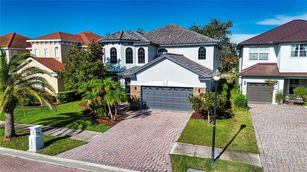 Photo of 18048 Java Isle Drive, Tampa, FL 33647 (MLS # A4684711)