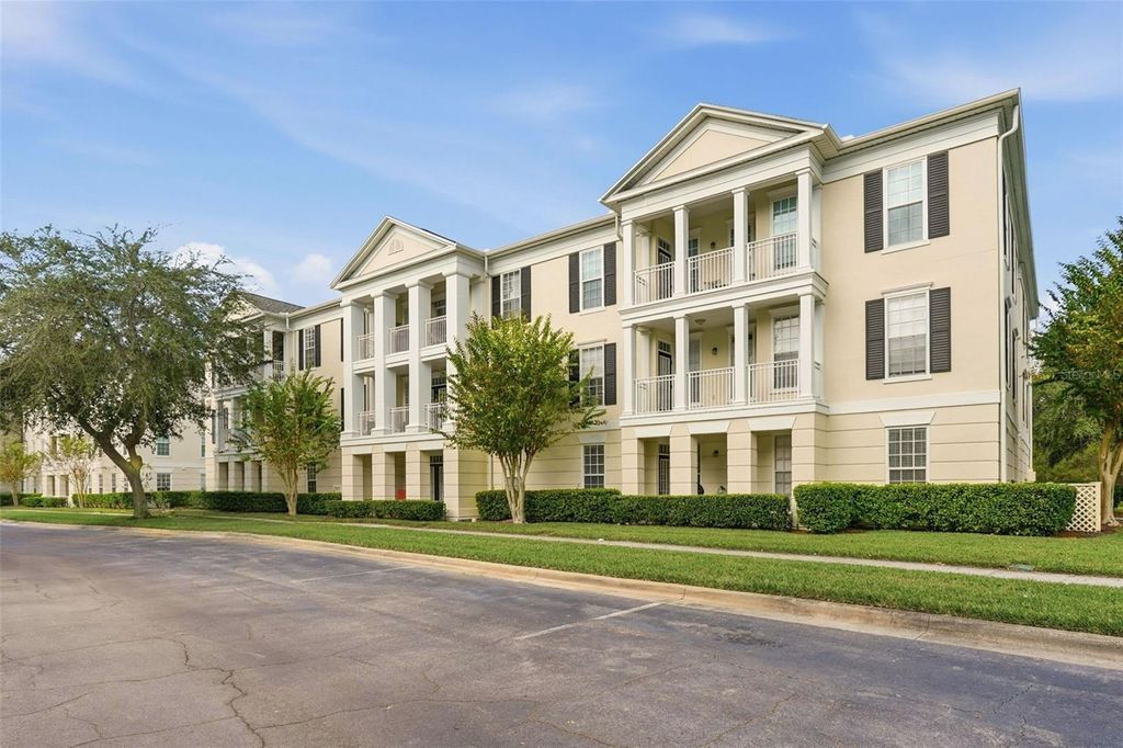 Photo of 231 Goldenrain Drive #101, Celebration, FL 34747 (MLS # S5140847)