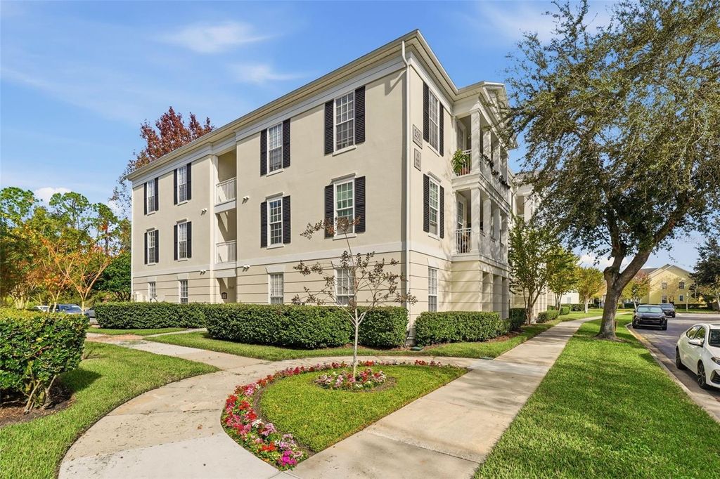 Photo of 231 Goldenrain Drive #101, Celebration, FL 34747 (MLS # S5140847)