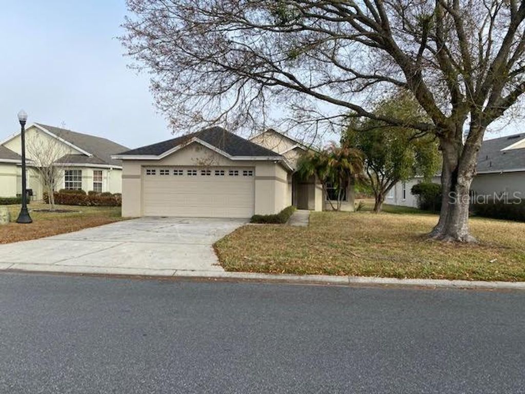 Photo of 2002 Rocky Pointe Drive, Lakeland, FL 33813 (MLS # O6388785)