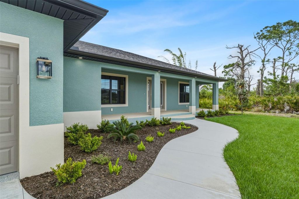 Photo of 7399 Worthington Terrace, Port Charlotte, FL 33981 (MLS # TB8499603)