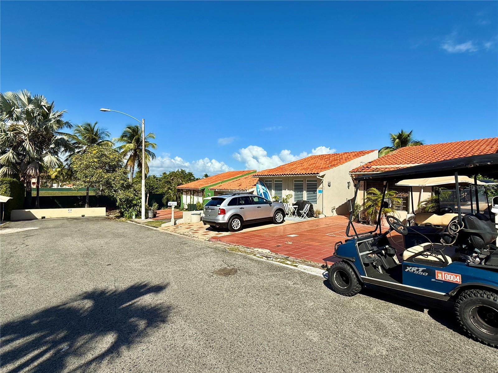 Montecarlo 217 is a charming townhouse located in the heart of Palmas del Mar, a world-class resort community in Puerto Rico. This residence features an open floor plan with high ceilings throughout the living area, creating a sense of space and sophistication. The home offers four comfortable bedrooms and two full bathrooms, providing both privacy and style. Just a short walk away is Palmanova Plaza, a vibrant center with restaurants, a supermarket, and essential services. The property is ideally situated to enjoy the tranquility of a private community while remaining close to the beache, a playground, a skate park, and the Tennis Center, making it perfect for both active lifestyles and leisurely living. A generator ensures continuous comfort, and with its availability for short-term rentals, this townhouse is not only a home but also a smart investment opportunity. Palmas del Mar also offers golf courses, equestrian trails, and a marina, further enhancing the appeal of this property at a highly attractive price.
