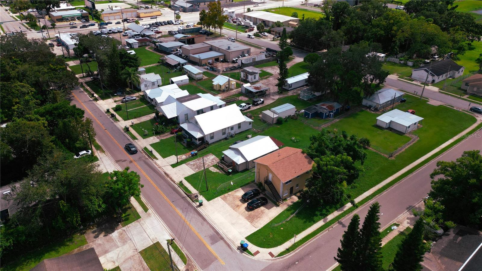 We are pleased to present Kaley Square, a mixture of 32 commercial/residential units on 12 lots totaling 4.27 acres. The prospective income upon increasing rents is estimated at $500,000 and the seller will consider seller financing. The property has been over 90% occupied for decades and has long term tenants spanning back to the 90's. This investment offers a prospective 10%+ cap with the opportunity to redevelop the site and own nearly an entire city block. Communication with the county shed light on the option to change the zoning and FLU to Neighborhood Commercial and increase value in the site for future redevelopment. This property is truly one of a kind.
