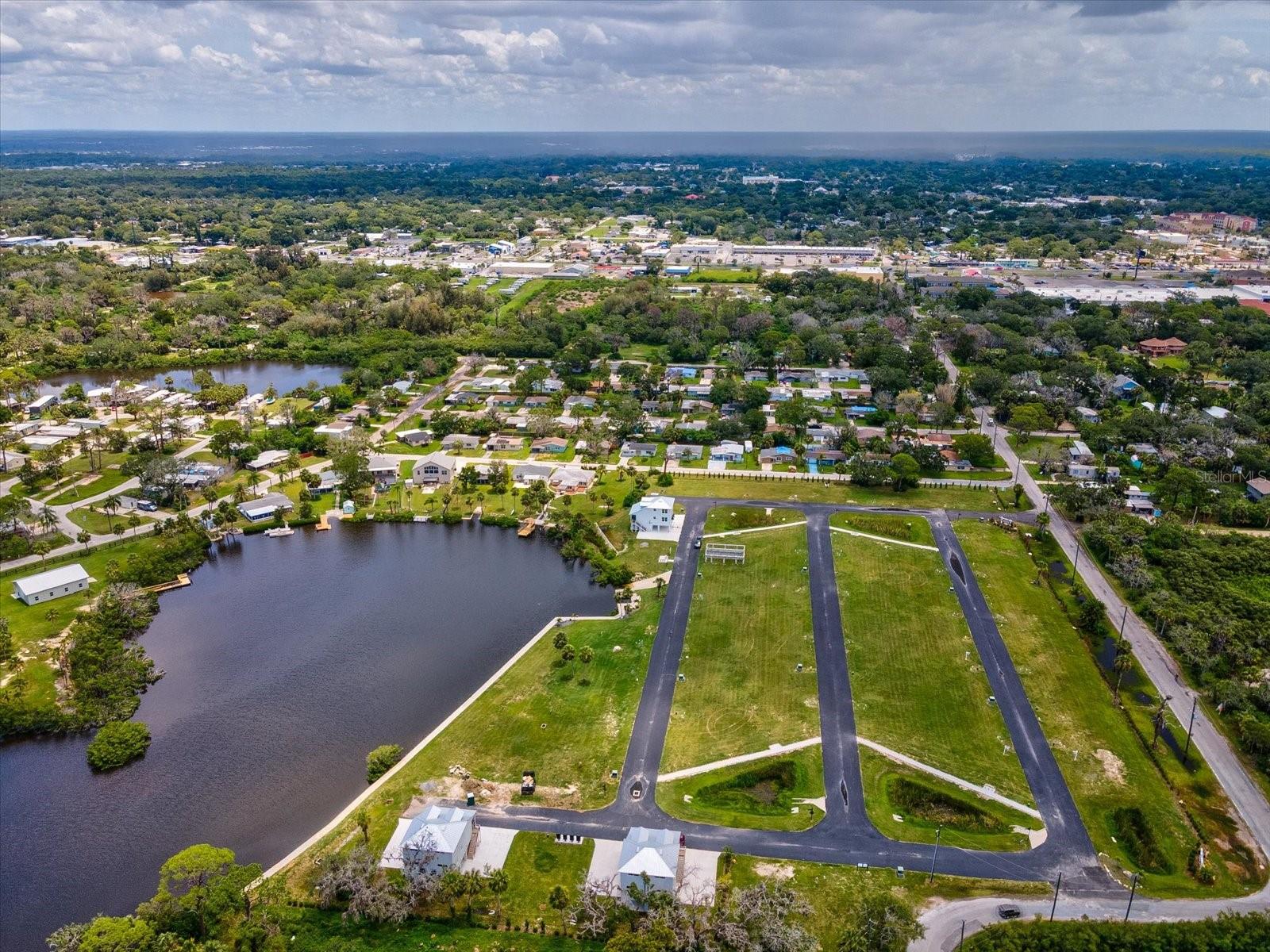 COTTAGES/OYSTER BAYOU TRACTS A - Land