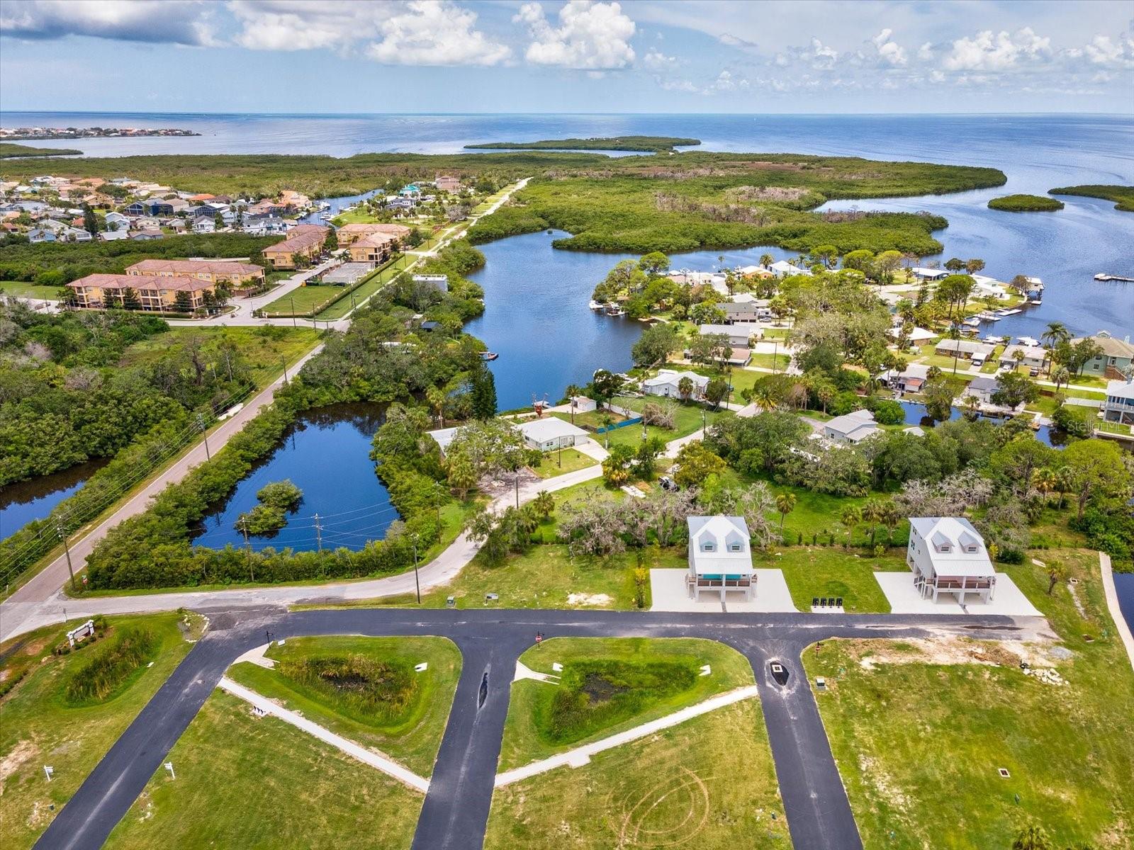 COTTAGES/OYSTER BAYOU TRACTS A - Land