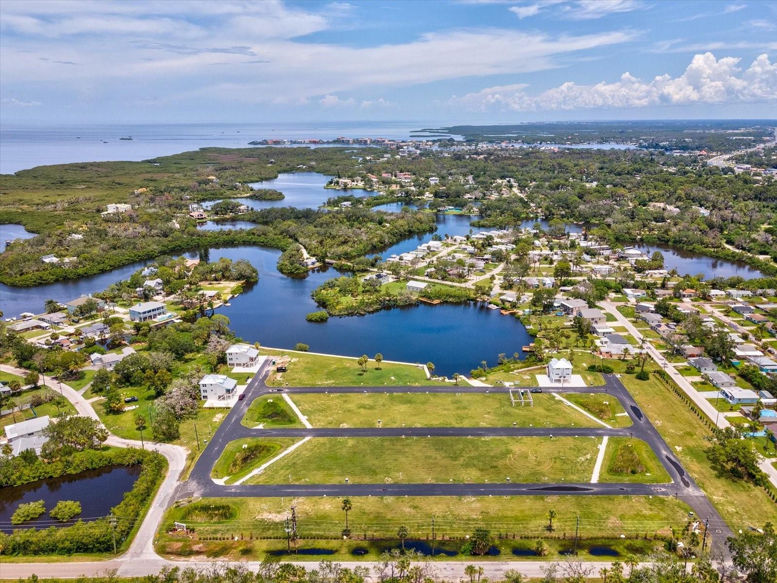 COTTAGES/OYSTER BAYOU TRACTS A - Land