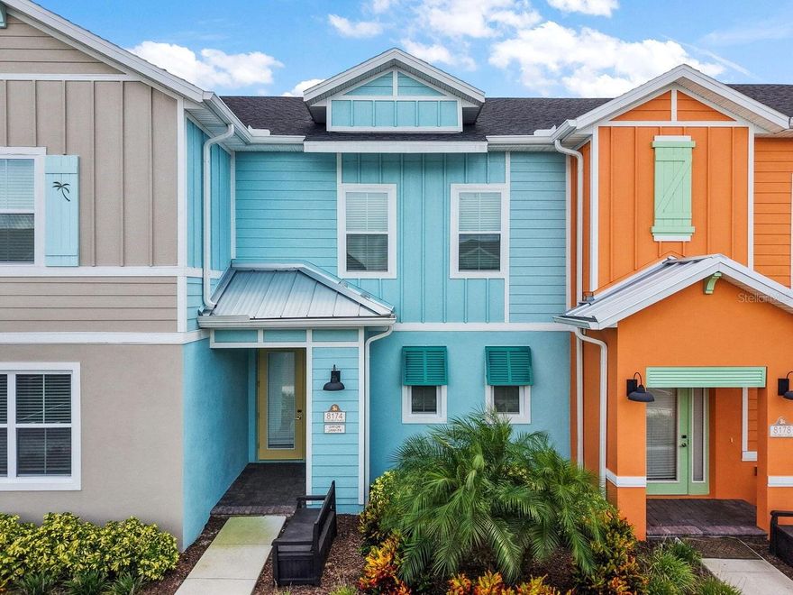 Step into this brand-new, fully furnished, upgraded 2-bedroom, 2.5-bath townhouse with an upstairs bonus room area that's perfectly positioned within the desirable Margaritaville Community. Designed for comfort and relaxation, this home offers a spacious open-concept living and dining area, a modern full kitchen, and spa-style bathrooms that make every day feel like a vacation. Enjoy your morning coffee or evening cocktail from your private outdoor terrace, surrounded by lush tropical scenery. Located just minutes from Disney World, this resort-style community features a spectacular lagoon-style pool and amenities, world-class water park, luxurious spa, a fitness center. Close to shopping, dining, and entertainment. Perfect Primary residence, vacation home or Investment Property.