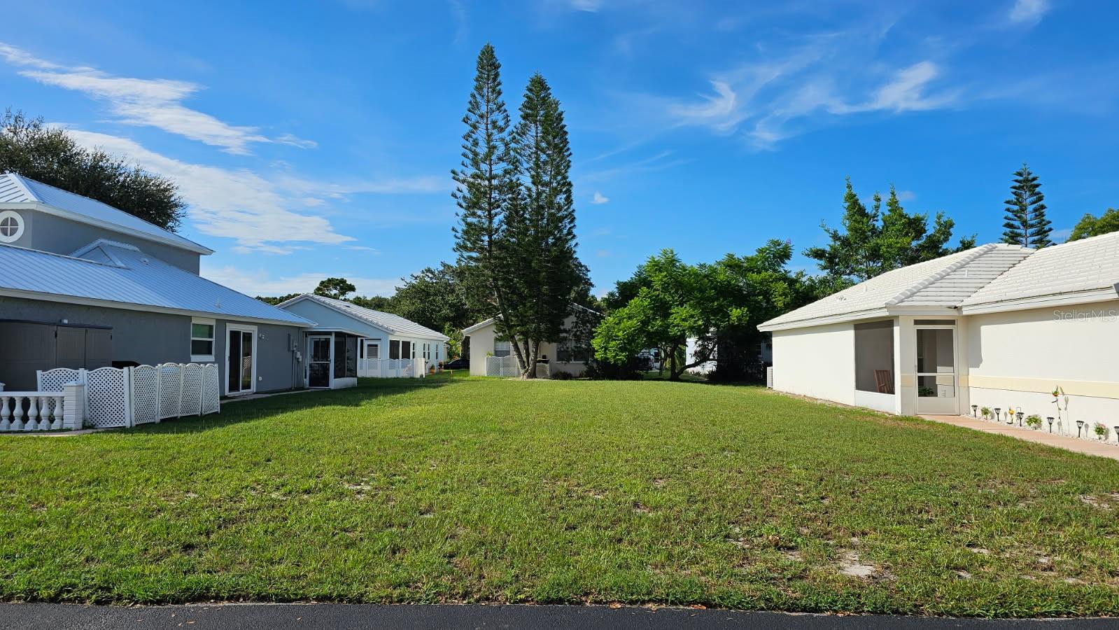 Vacant Lot in Bermuda Walk – Shovel Ready, Impact Fees Paid & Prime Location! Welcome to your opportunity to build in the highly desirable Bermuda Walk community in Palm Bay, Florida! City water and sewer available. This cleared and shovel-ready parcel offers 45 feet of road frontage and is nestled in a well-established neighborhood with a low HOA and sparkling community pool. The HOA includes lawn maintenance and community mailboxes for effortless living and peace of mind. Perfectly situated just minutes from shopping, grocery stores, restaurants, and major roadways, this lot is ideal for your dream home or next investment property. The sale includes a completed survey and home design plans, saving you time and money as you begin your build. Don’t miss this rare chance to own in one of Palm Bay’s most convenient and attractive locations! All information is deemed reliable and shall be independently verified.