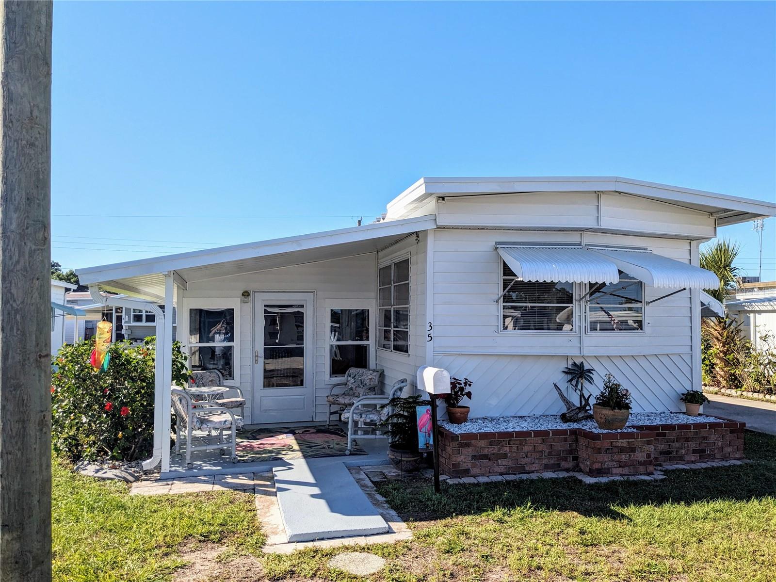 Perfect home for the winter...or...Full time resident. This Well maintained 2 bed 1 bath home in the co-op community of Brook to Bay offers you a Florida getaway minutes to area beaches, shopping, restaurants and more. With low HOA fee and an active community offering Heated Pool, Bocce, Shuffleboard and Large Clubhouse hosting many activities for you to choose from, you will not be dissapointed. Have a small boat or kayaks? No problem! Boat slips available on a first serve basis with access to the gulf of mexico. Recently updated, this cozy home offers a second bedroom off the lanai with separate entrance and yes it is air conditioned. Your remodeled bathroom also includes the stacked washer and dryer so no need to haul laundry out to the shed. LVT flooring and fresh paint just makes this home feel like home. Bring your golf cart or bike and enjoy the fresh air as you ride around this centrally located community. Comes "Turn-Key Furnished"! Owner is Motivated call now!