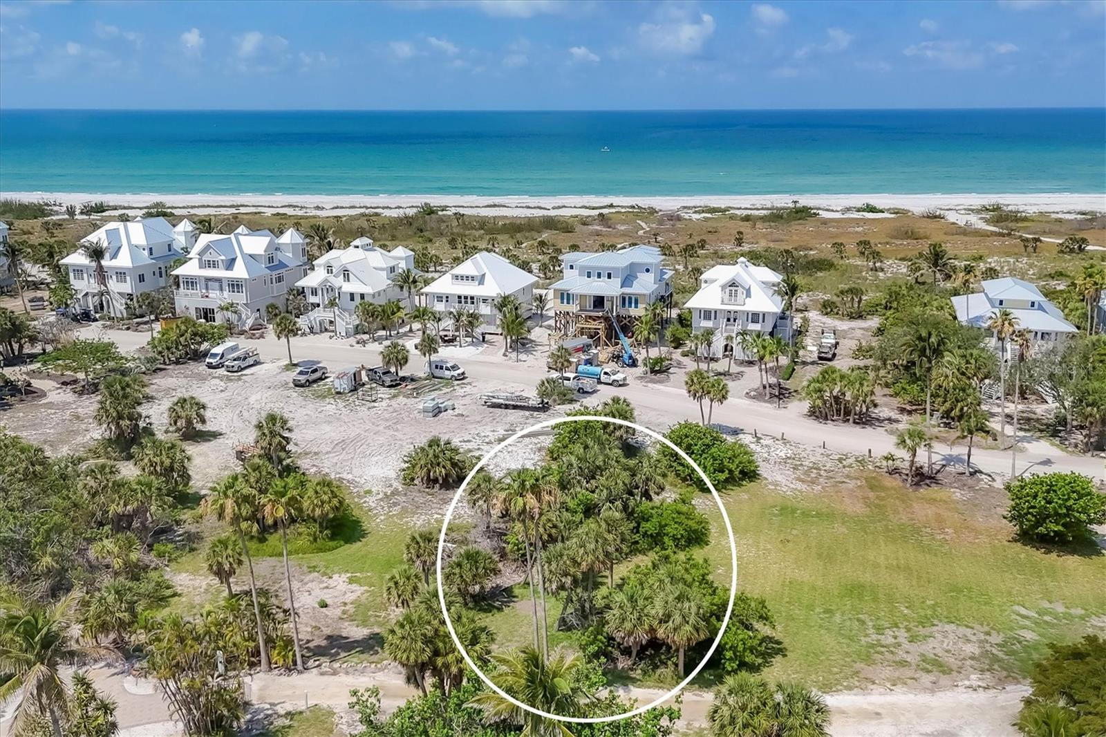 Welcome to Palm Island and the Palm Island Resort. This vacant piece of land has surveys and house plans for a buyer's review. This parcel within a gated community is close to a beach access leading to our sandy beaches for relaxing walks, wild life enjoyment as well as beautiful sunsets. The amenities include the tennis courts, swimming pools and pickleball courts, as well as first come first serve boat dockage with no bridges to the intracoastal waterway and the Gulf of Mexico. Use of the docks is part of your resort service program. The Rum Bay Restaurant is a quick golf cart ride from this property. If you're looking for a place secluded yet accessible, you've just found it.