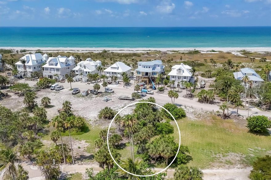 Welcome to Palm Island and the Palm Island Resort.  This vacant piece of land has surveys and house plans for a buyer's review.  This parcel within a gated community is close to a beach access leading to our sandy beaches for relaxing walks, wild life enjoyment as well as beautiful sunsets.  The amenities include the tennis courts, swimming pools and pickleball courts,  as well as first come first serve boat dockage with no bridges to the intracoastal waterway and the Gulf of Mexico.  Use of the docks is part of your resort service program. The Rum Bay Restaurant is a quick golf cart ride from this property. If you're looking for a place secluded yet accessible, you've just found it.