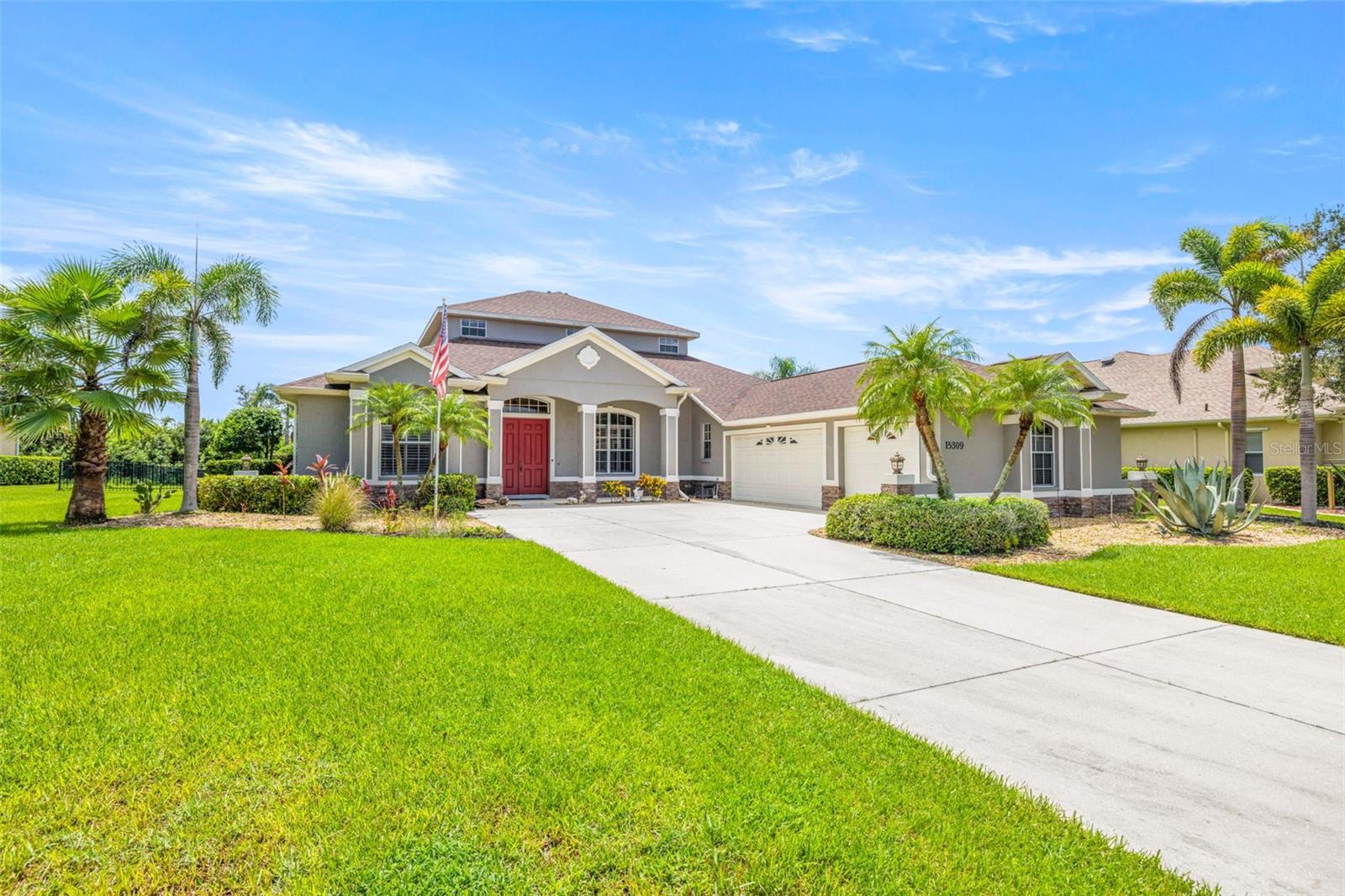 One or more photo(s) has been virtually staged. Potential multi-generational property! Experience luxurious living in this stunning 3,417 sq. ft., 4-bedroom, 3.5-bathroom pool home located in the desirable Twin Rivers community. This residence offers spacious interiors, a 3-car attached garage, and a light-filled open-concept living area with captivating views of the custom pool, spa, and expansive backyard. The three-way split floorplan provides flexibility and privacy. The second floor features 1 bedroom with separate living room, bathroom, kitchenette and its own private balcony overlooking the large backyard and pool. The gourmet kitchen is equipped with stainless appliances, quartz countertops, a tile backsplash, center island and a breakfast nook, offering abundant seating for casual dining or entertaining. Enjoy the ease of maintenance with hard surface flooring throughout the first-floor living spaces, including the primary bedroom. Secondary bedrooms are comfortably carpeted. The conveniently placed laundry room includes a sink for added functionality. The primary bathroom is a luxurious retreat, featuring a double vanity, a garden soaking tub, a spacious stall shower with beautiful decorative tile, and two large walk-in closets. The backyard is fully fenced and has a custom pool with a hot tub and screened/covered lanai provide a private oasis for outdoor enjoyment and entertainment, complete with a built-in outdoor kitchen. The home boasts meticulous landscaping, adding to its impressive curb appeal. Twin Rivers is a well-established community known for its architectural charm. It offers convenient access to a wide array of attractions in the Tampa Bay area, including Sarasota, Lakewood Ranch, Gulf beaches, boating activities, a variety of local shopping and dining establishments, and easy access to Interstate-75 and two nearby airports for convenient commutes to points north and south.