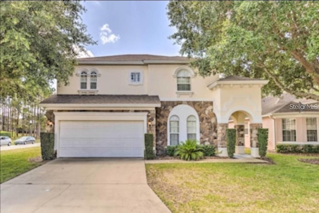 Photo of 214 Tupelo Circle, Davenport, FL 33897 (MLS # S5126692)