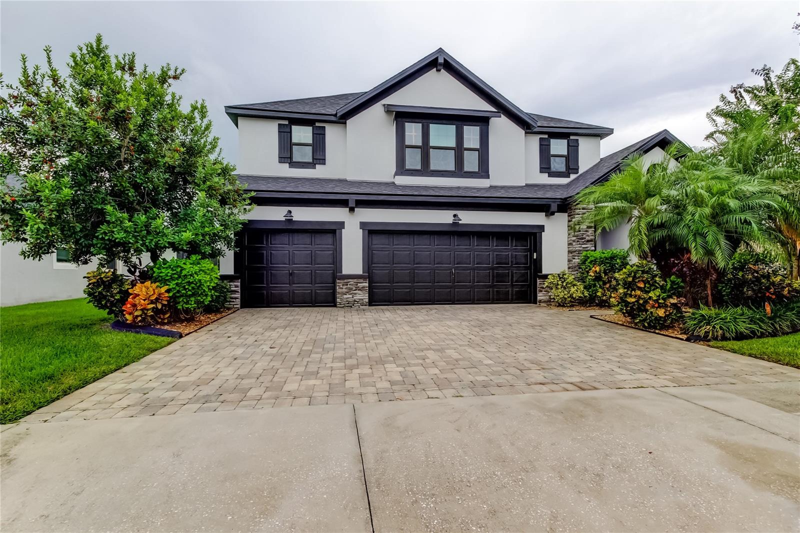Short Sale. This spacious 4BR/3.5BA home with den, loft, and 3-car garage on a private conservation lot with no backyard neighbors offers all the space and versatility you have been looking for! The heart of the home is the kitchen and great room, featuring luxury vinyl plank flooring, high ceilings, and natural light. The kitchen offers granite counters, butler’s pantry, walk-in pantry, and breakfast nook overlooking your huge back yard. The ground floor primary suite includes a spa-like bath with dual vanities, soaking tub, walk-in shower, and custom closet. The main level is completed by an oversized formal dining room, and the front office, ideal for remote work. Upstairs, the loft provides flexible living space, plus two bedrooms share a bath and another has its own en-suite. Dual screened porches overlook peaceful conservation views. The Triple Creek community includes resort-style amenities like two pools, splash pad, fitness center, tennis and basketball courts, dog park, and walking trails. You will never want to leave!