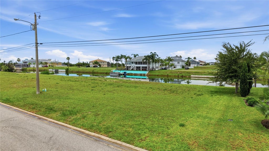 Photo of 3431 Jewfish Drive, Hernando Beach, FL 34607 (MLS # O6423513)