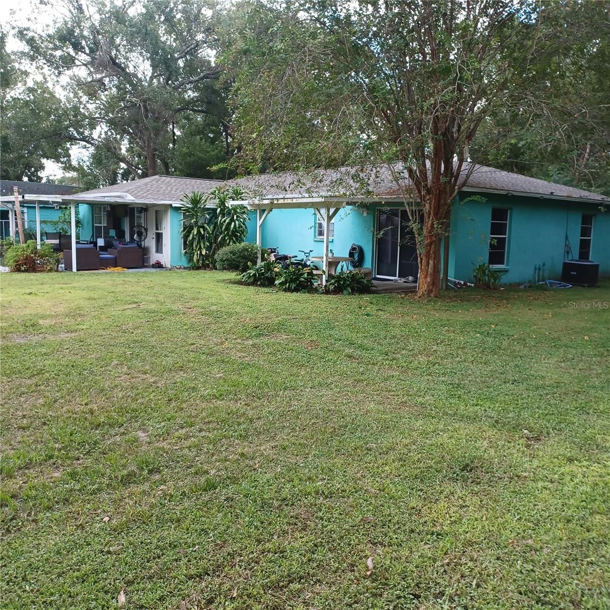 A great opportunity awaits you with this spacious 1,700-square-foot home situated on a generous half-acre lot. Enjoy the freedom of no HOA restrictions and the privacy of a fully fenced and gated yard. This property is tucked away on a cul-de-sac, providing a serene setting with a neighbor on one side and tranquil woods on the other.
Inside, you'll find a massive master bedroom and bath, an oversized utility room with plenty of cabinets, and a large galley kitchen featuring an abundance of storage. Outside, the possibilities are endless. The expansive yard provides ample space to park large work vehicles, boats, or any of your toys.
With a prime location just five minutes from I-4, you'll have easy access to everything you need. This home is a rare find, offering both a comfortable interior and an exceptional lot. It's the perfect blend of privacy, space, and convenience.