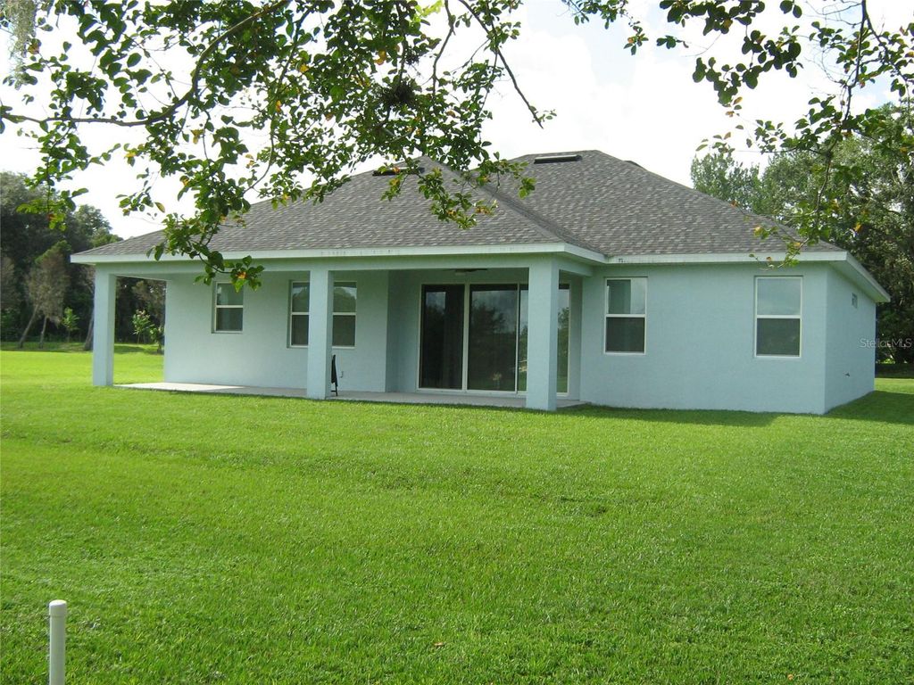 Photo of 535 Dowling Circle, Lady Lake, FL 32159 (MLS # W7885433)