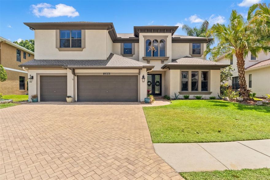 Welcome to 12818 Eagles Entry Drive, where thoughtful upgrades, timeless design, and exceptional views come together in a beautifully maintained home. 

At the heart of the home is a stunning kitchen featuring white wood cabinetry, a striking blue island, sleek quartz countertops, beautiful tile backsplash and GE Café appliances—perfectly blending style and functionality for everyday living and entertaining. The adjacent family room offers a warm and inviting atmosphere with a wood-burning fireplace, along with surround sound speakers and receiver that convey with the home.

This spacious and versatile floor plan includes 4 bedrooms, 3 full bathrooms, and 2 half baths, including a convenient pool bath. A private office is located downstairs, ideal for working from home, while upstairs two bedrooms are connected by a Jack-and-Jill bathroom. Additional living spaces include a loft and a large bonus room—perfect for a media room, playroom, or home gym.

Beautiful hardwood flooring flows throughout all common areas both downstairs and upstairs, complemented by plantation shutters throughout the home. Closets are thoughtfully designed with custom cabinetry, offering both style and organization.

With a brand-new 2026 roof and two A/C units replaced in 2019, you’ll enjoy both peace of mind and long-term efficiency.

Step outside to your private outdoor retreat, complete with a heated saltwater pool and spa, outdoor kitchen, and breathtaking golf course and creek views—an ideal setting for relaxing or entertaining year-round.

A 3-car garage provides ample storage and convenience, rounding out this exceptional property.

Located within The Eagles, a premier gated golf community, residents enjoy 24/7 security and access to two championship golf courses, a clubhouse with restaurant, playground, basketball, and tennis and pickleball courts. The active community features year-round events, holiday golf cart parades, and an annual neighborhood garage sale.

Zoned for highly rated schools, the home offers a convenient location with easy access to the Veterans Expressway, Tampa International Airport, Florida’s world-renowned beaches, and a variety of nearby retail and dining options.