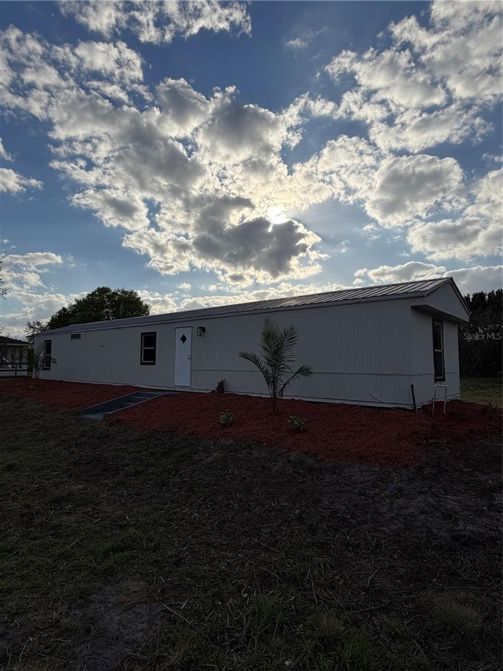 Photo of 530 N Datil Street, Clewiston, FL 33440 (MLS # TB8465965)