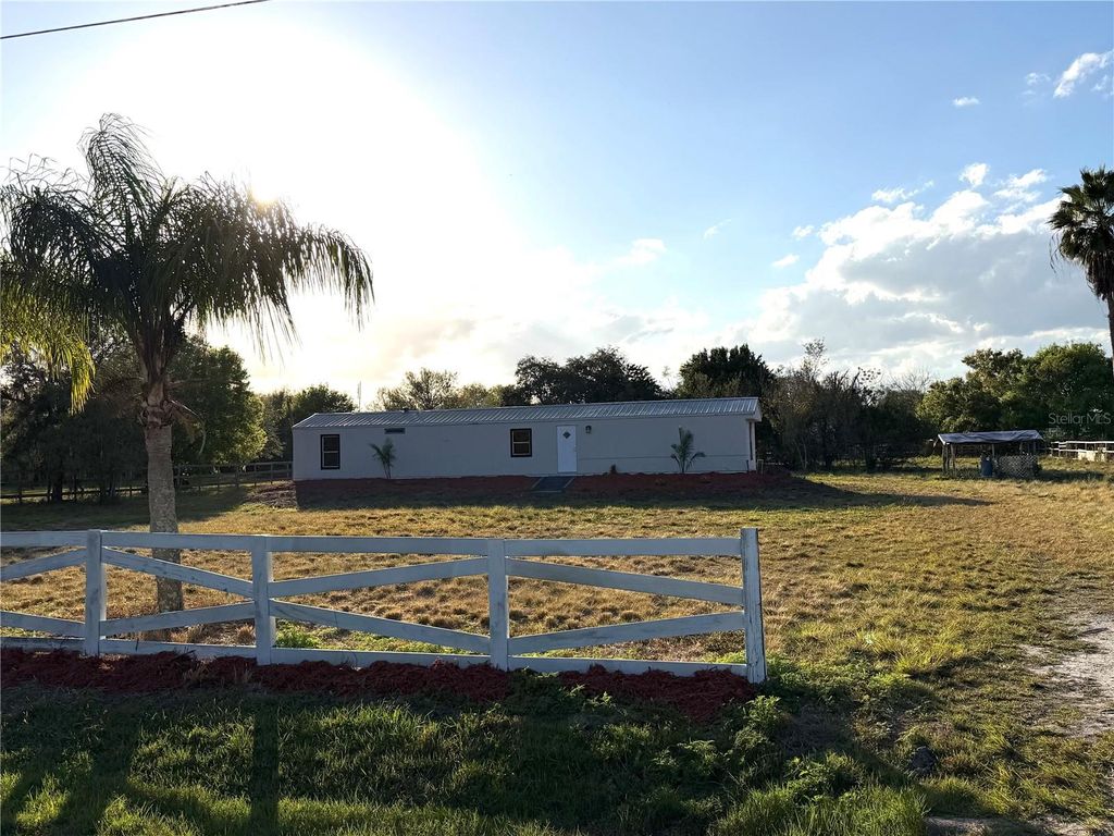 Photo of 530 N Datil Street, Clewiston, FL 33440 (MLS # TB8465965)