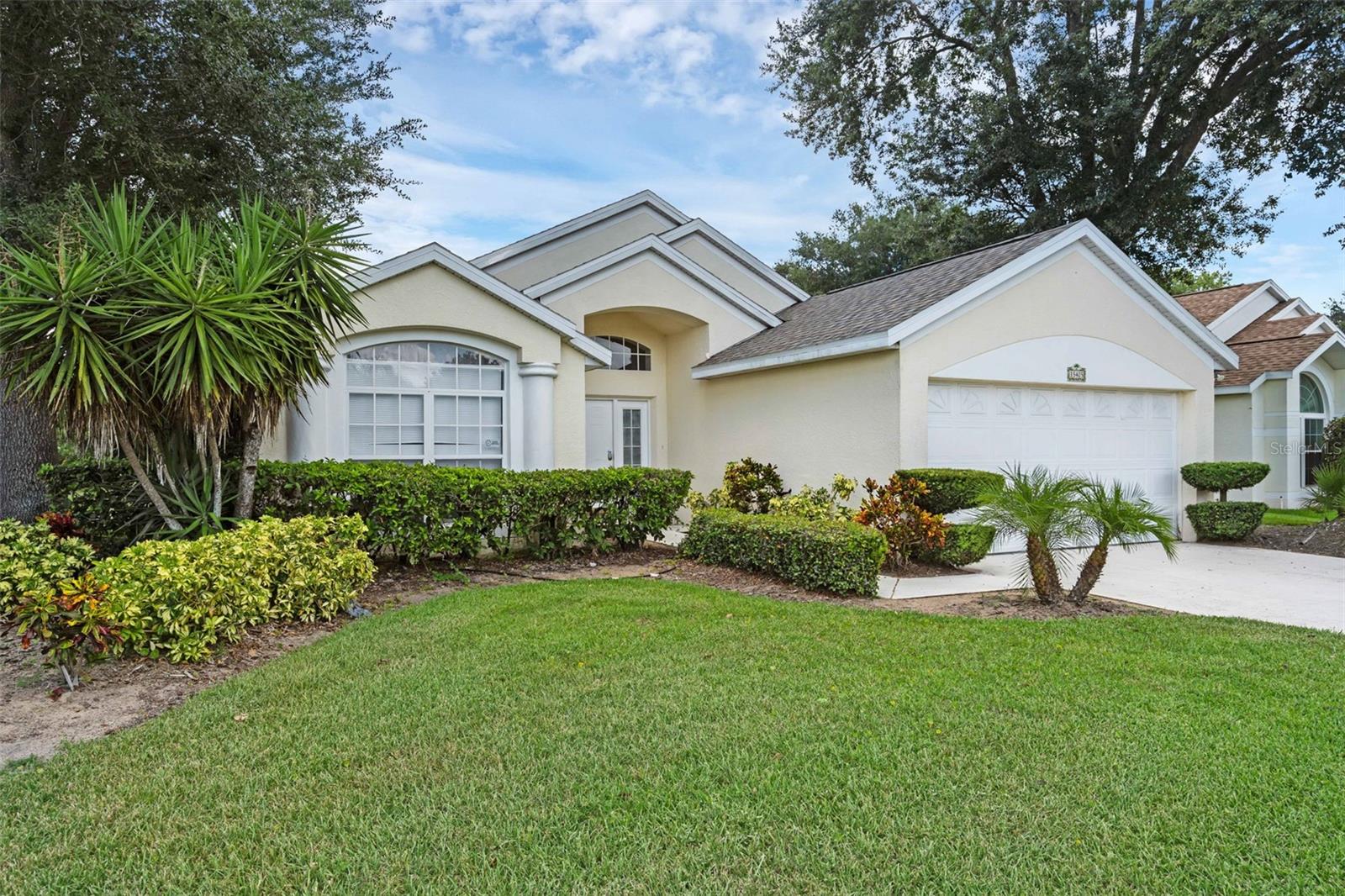 Tucked away at the end of a peaceful cul-de-sac in the gated community of Weston Hills, this well-maintained, fully furnished pool home offers the perfect balance of comfort, privacy, and flexibility—ideal for both short-term rental investors and those seeking a full-time residence or vacation getaway. Set on a premium conservation lot with no rear neighbors, you'll enjoy serene natural views from your screen-enclosed, heated pool and spa—a private outdoor retreat perfect for relaxing or entertaining. Inside you find a bright, open floor plan with a thoughtful split layout. The spacious primary suite features direct pool access and a large ensuite bath with dual vanities, a garden tub, and a walk-in shower. Two additional bedrooms and a full bath offer comfort and convenience for guests or family members. Located in the sought-after Four Corners area, Weston Hills offers resort-style amenities including two community pools, a splash pad, tennis and basketball courts, soccer field, playgrounds, and walking trails—all within a gated setting for added peace of mind. With easy access to US-27, Hwy 192, and the theme parks, plus endless shopping and dining options nearby, the location is as convenient as it is desirable. Whether you're looking to invest, settle down, or escape to Florida sunshine, this turn-key home offers it all.