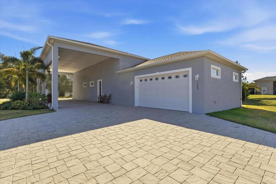 Are you ready to embrace the ultimate Florida lifestyle, a life of adventure, community, and unparalleled convenience? This dream can be your reality at Mt. Olive Shores North!

We're thrilled to present this MUST SEE RV port home nestled on a desirable CORNER LOT within this premier, guard-gated community. Mt. Olive Shores North isn't just a place to live; it's a vibrant community tailored for RV enthusiasts like you, offering resort-style amenities and a calendar brimming with engaging activities.  

Built in 2023, this 1600 sq. ft. home features a spacious, open floor plan, perfect for entertaining friends and family or simply relaxing in style. With two comfortable bedrooms, you'll have plenty of space for guests. But the real magic lies outside: a perfectly designed 18X58 pull-through RV port awaits, making your travel preparations a breeze. And for your everyday vehicles, a convenient 2-car garage provides ample parking and storage.  Offers everything you will want in a home.  

Don't miss this incredible opportunity to own a piece of paradise in Mt. Olive Shores North.

We urge you to call TODAY to schedule your private appointment. Seeing is believing, and we're confident that once you step inside this beautiful home, you'll understand why it's a MUST SEE. Let us help you make your Florida dream a reality!