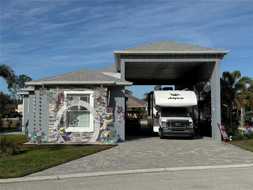 Are you ready to embrace the ultimate Florida lifestyle, a life of adventure, community, and unparalleled convenience? This dream can be your reality at Mt. Olive Shores North!

We're thrilled to present this MUST SEE RV port home nestled on a desirable CORNER LOT within this premier, guard-gated community. Mt. Olive Shores North isn't just a place to live; it's a vibrant community tailored for RV enthusiasts like you, offering resort-style amenities and a calendar brimming with engaging activities.  

Built in 2023, this 1600 sq. ft. home features a spacious, open floor plan, perfect for entertaining friends and family or simply relaxing in style. With two comfortable bedrooms, you'll have plenty of space for guests. But the real magic lies outside: a perfectly designed 18X58 pull-through RV port awaits, making your travel preparations a breeze. And for your everyday vehicles, a convenient 2-car garage provides ample parking and storage.  Offers everything you will want in a home.  

Don't miss this incredible opportunity to own a piece of paradise in Mt. Olive Shores North.

We urge you to call TODAY to schedule your private appointment. Seeing is believing, and we're confident that once you step inside this beautiful home, you'll understand why it's a MUST SEE. Let us help you make your Florida dream a reality!