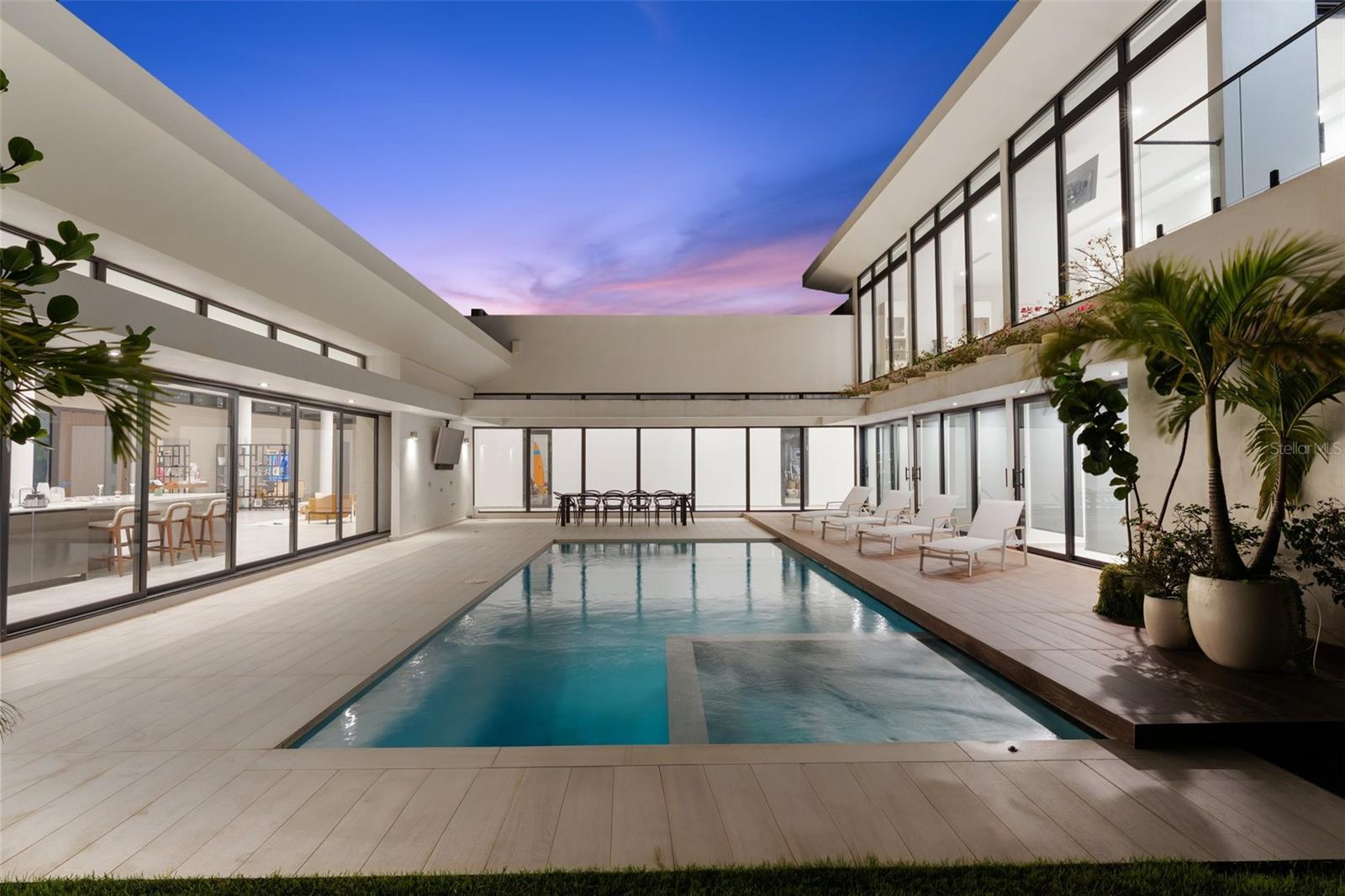This is not just a home. It’s a statement. A 6-bedroom, 8-bathroom estate designed to impress at every turn. Walk into a 23.1 by 46.8 foot great room with soaring ceilings and a layout built for power, presence, and high-impact living.
The primary suite is tucked away on the second level for total privacy. It spans 17.2 by 38.6 feet, offering the kind of space and quiet luxury usually reserved for private resorts. A master bath that redefines personal comfort.
The kitchen is both functional and unforgettable. At 30.9 by 24.1 feet, it delivers a professional-grade experience with built-in oven, cooktop, convection system, wine refrigerator, solar hot water, and seamless flow into your living and dining areas.
Seven full bathrooms. One powder room. Zoned central air conditioning. Tile flooring throughout. Every finish and feature built to elevate your daily experience.
This is not for everyone. It’s for those who demand presence, privacy, and permanence. If you're ready to have a one of one experience with your loved ones and craete unforgettable memories.