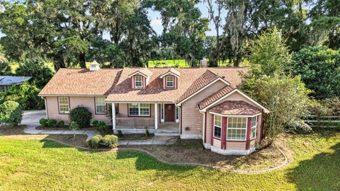 Photo of 20540 SW 5th Place, Dunnellon, FL 34431 (MLS # O6443936)