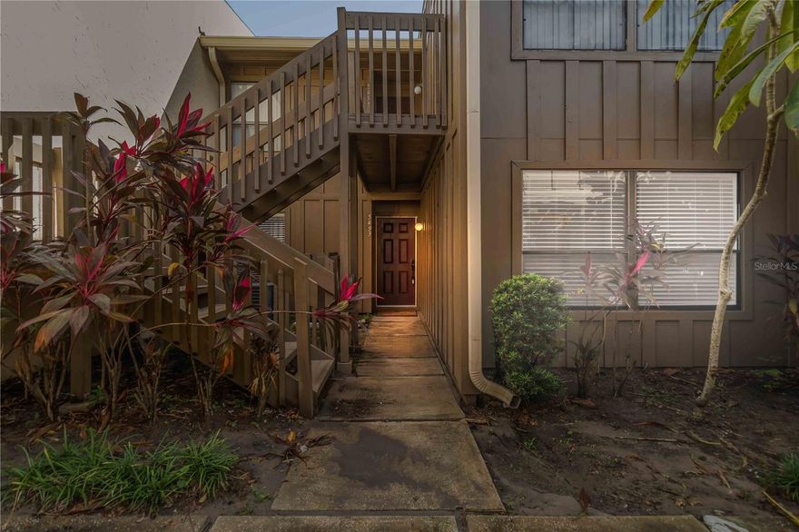 Welcome to this beautifully updated 2-bedroom, 2-bathroom condo in the sought-after Cypress Woods community. Offering 1,141 square feet of inviting living space, this home blends comfort, style, and convenience in an ideal location. Step inside to discover stunning new tile flooring throughout and an open layout that feels both spacious and welcoming. The kitchen features sleek stainless steel appliances, plenty of cabinet space, and a cozy eat-in area, perfect for casual meals. The dining area flows effortlessly into the living room, where elegant wood coffered ceilings add character and warmth. A sliding glass door fills the space with natural light and opens to the outdoor area, creating a seamless indoor-outdoor connection. The primary bedroom offers a private retreat with its own sliding glass door and an en suite bath featuring dual sinks and a walk-in shower. The second bedroom and bath provide comfortable accommodations for guests or a home office. Enjoy low-maintenance living with an HOA that covers water, sewer, trash, exterior maintenance, pest control, pool service, and high-speed internet. Community amenities include two sparkling pools and tennis court for recreation and relaxation. Located just minutes from Universal Studios, I-4, shopping, dining, and entertainment, this home offers the perfect mix of tranquility and accessibility. Don’t miss your chance to experience the best of Orlando living in this beautifully maintained condo. Mortgage savings may be available for buyers of this listing.