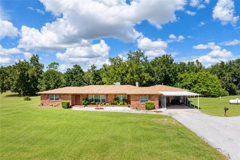 Photo of 24438 Harborview Road, Port Charlotte, FL 33980 (MLS # C7531866)
