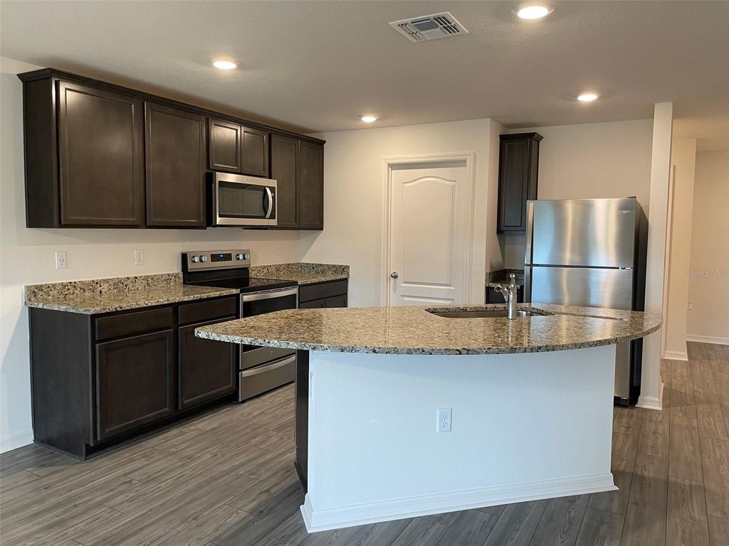 Photo of 1569 Wynford Circle, Tavares, FL 32778 (MLS # O6378875)