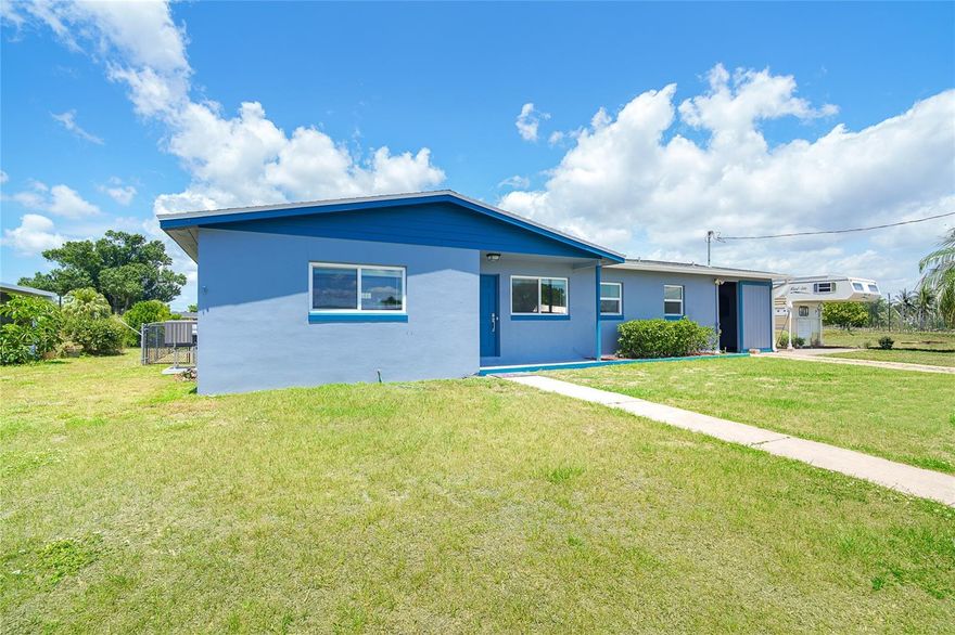 One or more photo(s) has been virtually staged. Start your mornings with coffee by the water and end your days watching the sky melt into the canal, this is the lifestyle people come here for. In the heart of Port Charlotte on a canal with direct access to Charlotte Harbor, this completely updated 2 bedroom, 2 bath home is your easy, low-maintenance escape from the cold. Bring the boat, there’s a private dock waiting. Bring the RV, there’s room to park it with electrical hookup. Bring the dogs, the fenced yard has them covered. Inside, everything has already been done for you. A bright, fresh kitchen with modern cabinetry and stainless appliances, updated bathrooms, and durable tile flooring throughout mean you can spend less time maintaining and more time living. Major updates are handled too, with a new roof 2023 and new AC 2025, new electrical panel 2016 so you can settle in with confidence. There’s even a shed for all your gear, fishing rods and beach toys, because life here happens outdoors. And it's right where you want to be, close to shopping, dining, and medical facilities, with a short drive to the beaches, downtown Punta Gorda, and Fishermen’s Village. Whether you’re looking for a winter retreat or a full-time waterfront lifestyle, this one checks the boxes without the hassle. Simple, updated, and right on the water, just the way it should be.