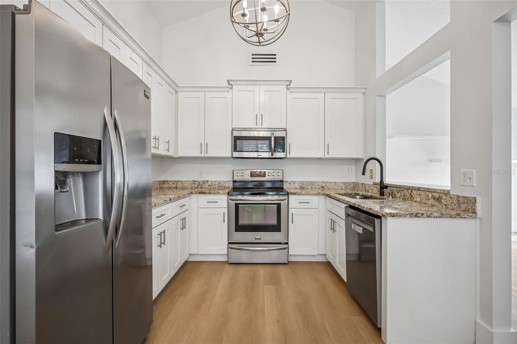 Photo of 2805 Northcote Drive, Palm Harbor, FL 34684 (MLS # TB8551853)