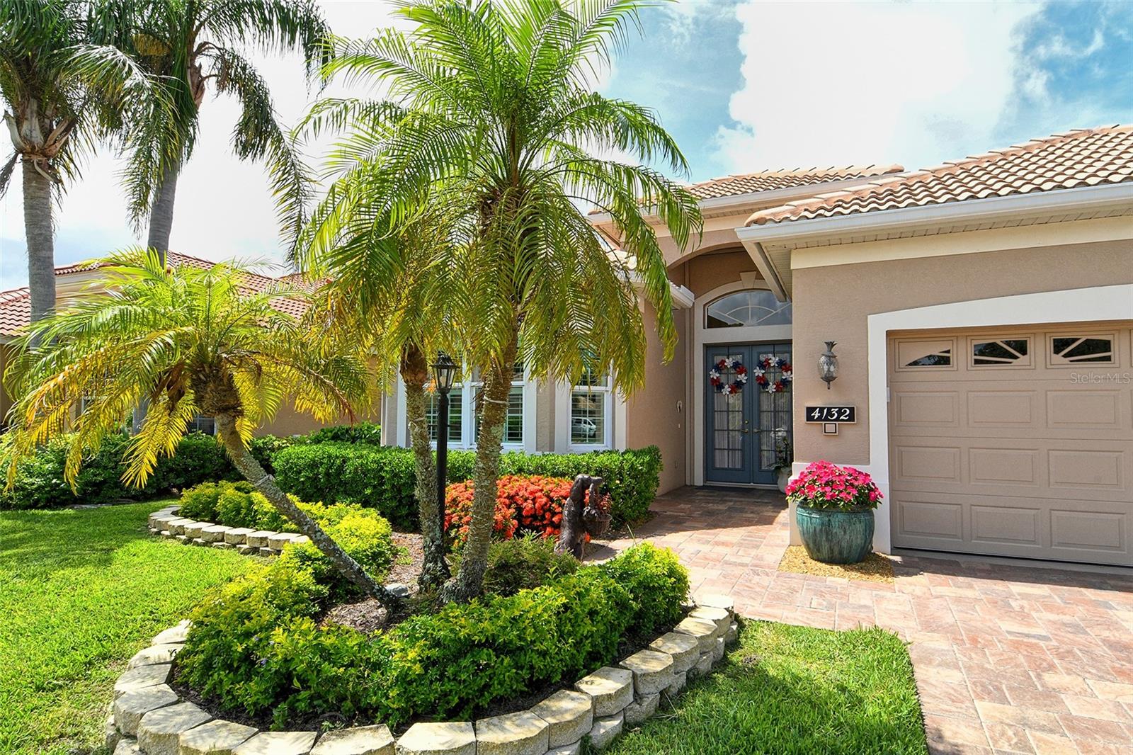 Welcome to Willowbrook, a lovely, gated small enclave of 54 custom homes in Sarasota just south of Palmer Ranch. This charming three bedroom, two bath home is move in ready and has everything you need to live a comfortable lifestyle. The kitchen has granite counter tops, stainless appliances, a gas stove ( Willowbrook has natural gas), a delightful breakfast and lunch area and a built- in desk. The living room is open to the tropical pool and extended lanai and offers a tranquil retreat for swimming, reading or enjoying a cook out. Custom built ins in the living room, dining room and den are abundant, and crown molding, shutters and window treatments throughout make this home warm and inviting. The oversized primary bedroom has an additional space for a desk or sofa and chairs, and two walk in closets plus a large linen closet for the primary bath, with two sinks, a tub and separate shower. The second guest suite has it's own private space, bathed in natural light, and has an en suite bathroom. The third bedroom is a flexible space as a den with beautiful custom built- ins and a closet, however can easily be used for additional guests. Hurricane impact windows, and shades are a bonus, and the home has a tankless water heater. The landscaping and irrigation for the home is included in the HOA, PLUS the homes are power washed every 3 years and painted every 7 years, all included! Willowbrook also has a community pool and is so convenient to Siesta Key, shopping, restaurants, nearby golf courses, and downtown Sarasota. Be sure to see this lovely home!