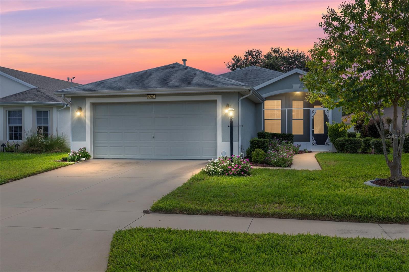 Brand New HVAC & New Roof to be installed! This priced-to-sell 3/2 Balmoral model has a lot to offer as the high-priced repairs have been completed. Home has a screened entrance with a leaded-glass front door that floods the entryway with natural light. The eat-in kitchen has lots of cabinets as well as a pantry for storage. The living room opens to a private enclosed lanai with no rear neighbors. The spacious primary ensuite has a walk-in closet, and the bathroom is complete with a garden tub and walk-in shower. There are two additional bedrooms and a bathroom for your guests. The garage can accommodate two cars and has pull-down attic access and pegboard for storage. Legacy of Leesburg Community has resort-style amenities, which include a heated pool, clubhouse, fitness center, tennis courts, pickleball courts, billiards room, groomed walking trails, and a softball field. This 55+ community offers a perfect mix of leisure and recreation. HOA fee includes cable, internet, lawn mowing, and use of a storage area for RVs & Boats. Don't miss the chance to make this home your own!