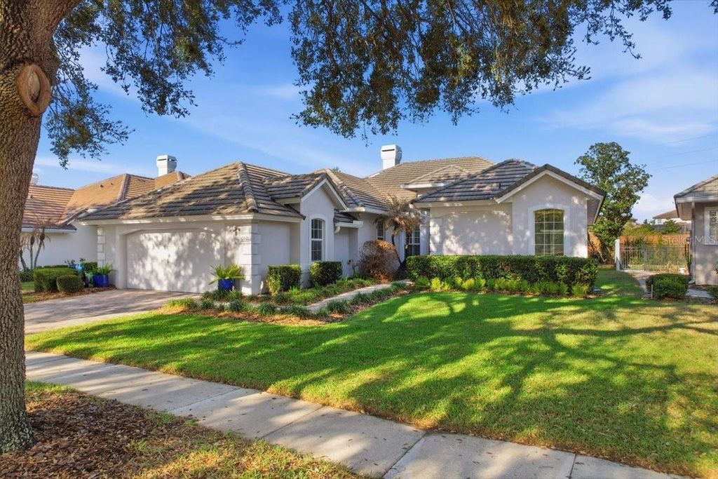 Photo of 10926 Woodchase Circle, Orlando, FL 32836 (MLS # O6392567)