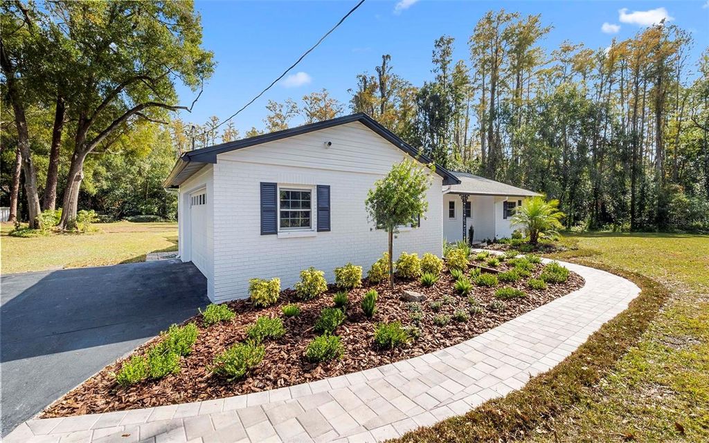 Photo of 11201 Hidden Valley Drive, Tampa, FL 33618 (MLS # TB8449861)