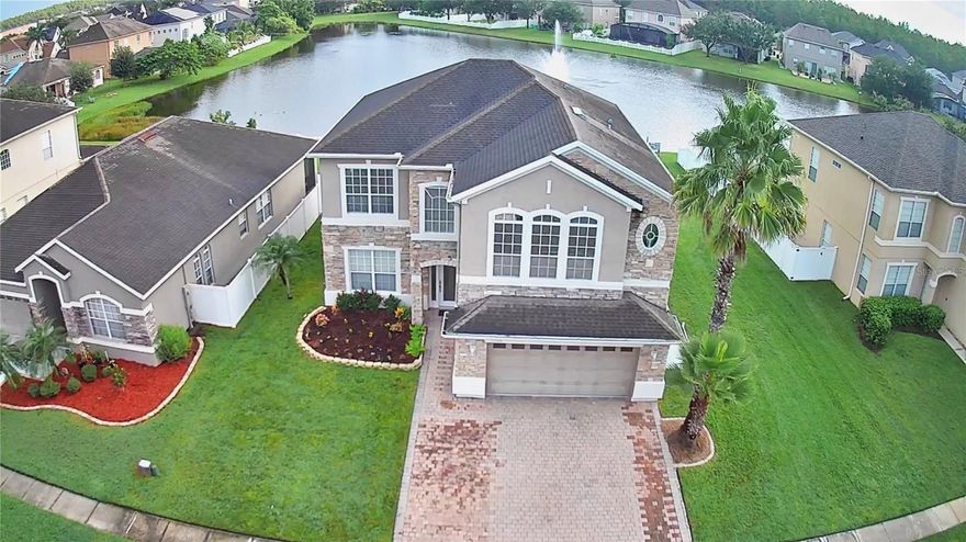 Welcome to your dream home!! 
This stunning 4-bedroom, 2.5-bathroom, 2,709 sqft, 2-story gem is the epitome of modern living in a tranquil, gated community.

As you approach, you'll be captivated by the picturesque curb appeal that sets the tone for what lies within. Step inside, and you'll be greeted by an open floor concept that seamlessly blends elegance and comfort. The heart of this home is a kitchen that will inspire your inner chef. With ample counter space, high-end appliances, and stylish finishes, it's a culinary enthusiast's dream come true.

One of the most exquisite features of this property is the private pool and spacious enclosed lanai. Imagine evenings spent with friends and family, overlooking the serene lake, as the sun sets behind the shimmering water—a true paradise for relaxation and entertainment.

Living in this secure, gated community offers not only peace of mind but also access to an array of amenities. The clubhouse is designed for your entertainment and relaxation needs, featuring a resort-style pool and a awesome playground. It's a place where memories are made and cherished.

Don't miss this opportunity to make  your forever home. Experience the perfect blend of luxury, tranquility, and community in one of Orlando's most sought-after neighborhoods. Your dream lifestyle awaits. Contact us today for a private viewing and start living the life you deserve.