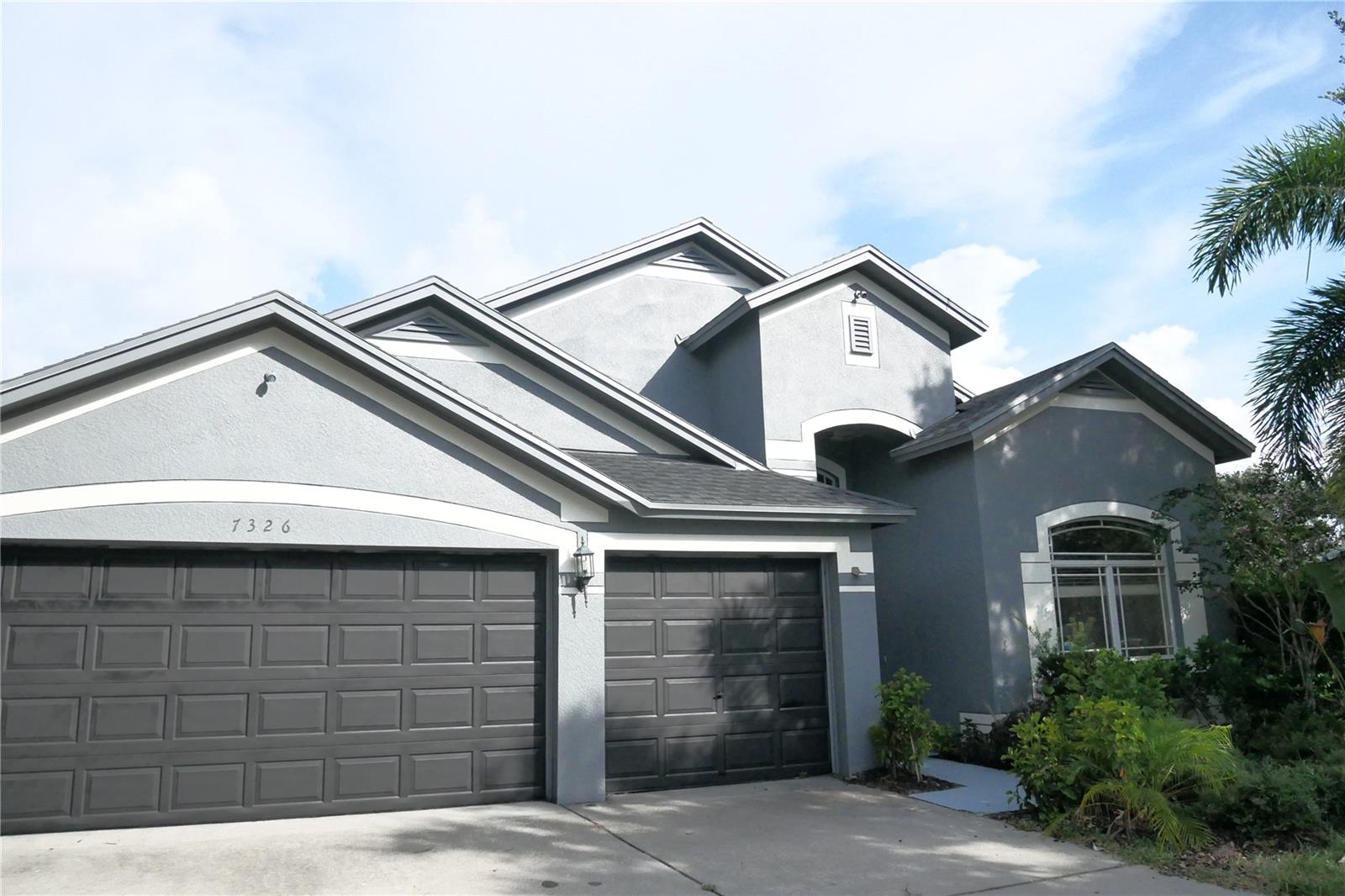Welcome to 7326 Guilford Pine Lane in the heart of Apollo Beach! This spacious 4-bedroom, 3-bath home sits on a desirable oversized corner lot in a quiet cul-de-sac, offering privacy and room to grow. With high ceilings, an open floorplan, and a versatile loft space, this home is perfect for families, investors, and first-time buyers alike. The large backyard is filled with Florida-native plants and features a screened-in patio, ideal for relaxing or entertaining with plenty of room to add a pool. A rare 3-car garage provides ample storage and parking. Don't miss the chance to make this beautifully located property your own!