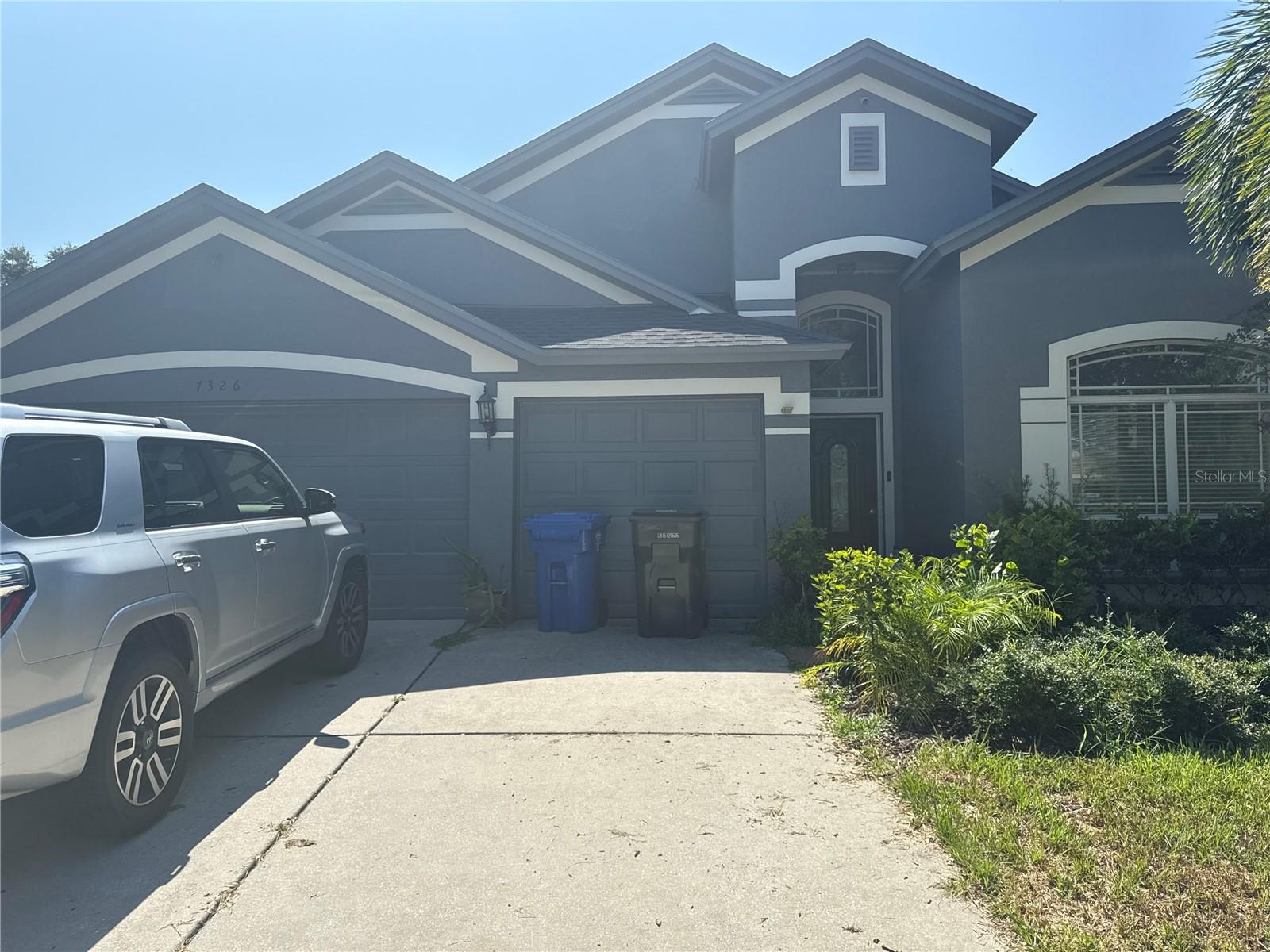 Welcome to 7326 Guilford Pine Lane in the heart of Apollo Beach! This spacious 4-bedroom, 3-bath home sits on a desirable oversized corner lot in a quiet cul-de-sac, offering privacy and room to grow. With high ceilings, an open floorplan, and a versatile loft space, this home is perfect for families and first-time buyers alike. The large backyard is filled with Florida-native plants and features a screened-in patio, ideal for relaxing or entertaining with plenty of room to add a pool. A rare 3-car garage provides ample storage and parking. Don't miss the chance to make this beautifully located property your own!
