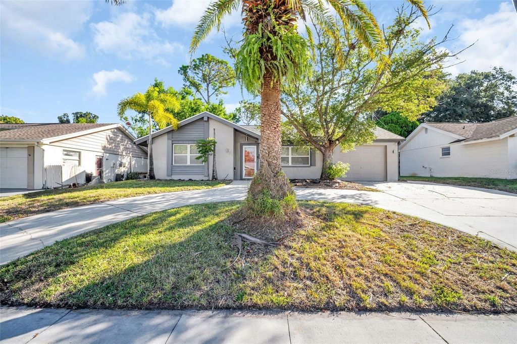 Photo of 12410 Partridge Hill Row, Hudson, FL 34667 (MLS # TB8448529)